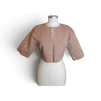 Top in maglia con paillettes