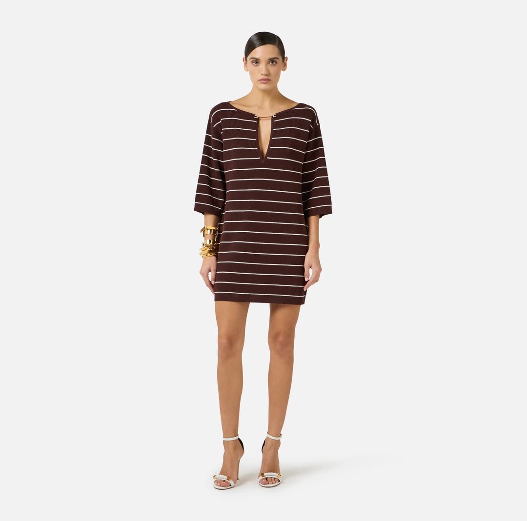 Mini abito in maglia con linea a sacchetto