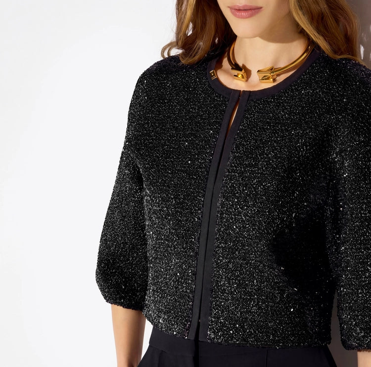 Top in maglia con paillettes
