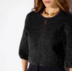 Top in maglia con paillettes