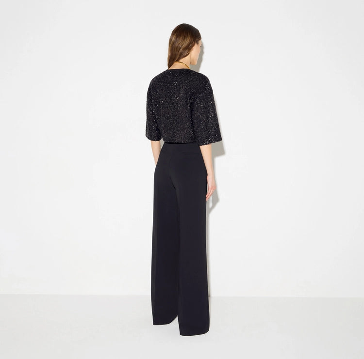 Top in maglia con paillettes