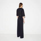 Top in maglia con paillettes