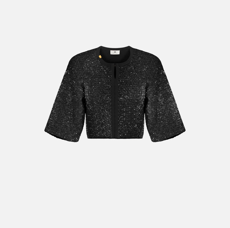 Top in maglia con paillettes